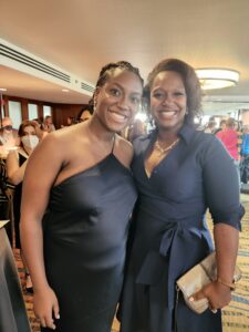 Taylor McGee celebrates her social poets award with her mother at NETWORK's Justice Ablaze gala