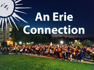 Text reads: An Erie Connection over a photo of an event with people holding signs and candles