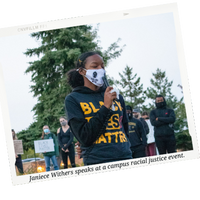 Janiece Withers, a Black woman in a Black Lives Matter t shirt speaks at a campus racial justice event.