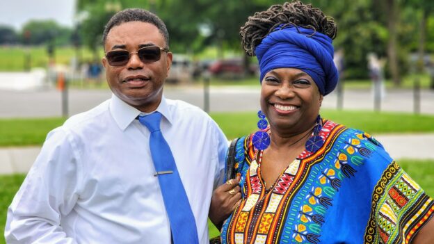 Jarrett Smith, NETWORK Government Relations Advocate, is pictured at a June 16 reparations event near the White House alongside Nkechi Taifa.