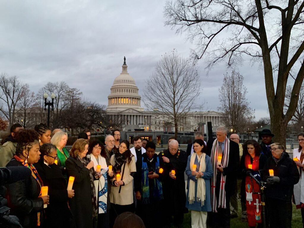 Christian leaders gather across from the U.S. Capitol for asunrise vigil organized by the Baptist Joint Committee for Religious Liberty and Faithful America, marking the second anniversary of the January 6 insurrection.