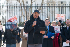 Christian Watkins speaks at the DFAD 100,000 petition drop-off at the White House, January 22, 2024.