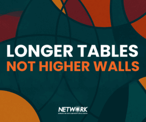 Take the Longer Table Not Higher Walls protest sign to your next vigil or march