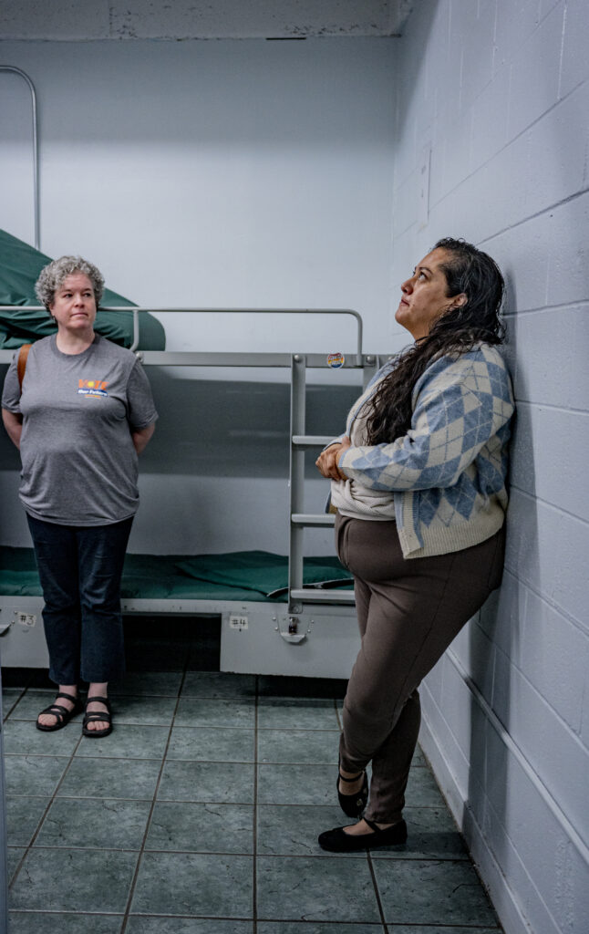 Sr. Deirdre Griffin, SSJ listens to Yesenia Lacayo of Mission Action in San Francisco during the 2024 Nuns on the Bus & Friends tour.
